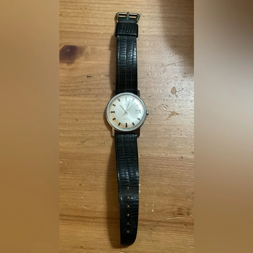 Timex: Men’s vintage (rare find) electromechanical wrist watch black wrist band.